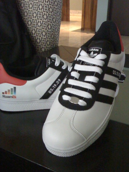 Custom Roambi-branded Adidas sneakers