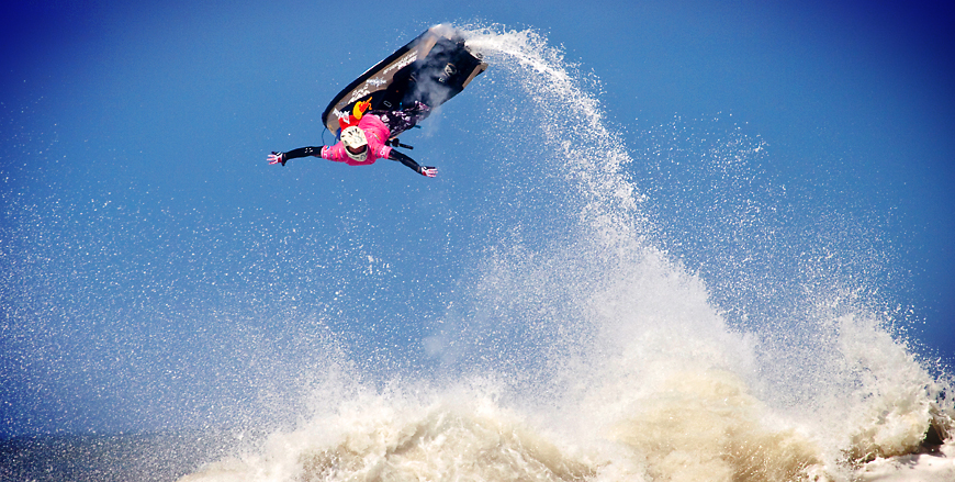 The &ldquo;Jerry Curl&rdquo; — no-hand look-back barrel roll, first time in competition